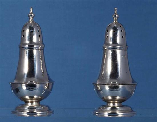 Three pairs of pepper casters.